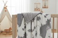 Gray calf minky baby blanket with gray backing in western nursery - lifestyle photo