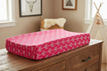 Hot pink arrow changing pad cover on dresser in western nursery - lifestyle photo