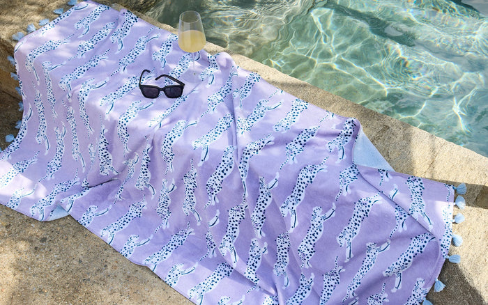 Leaping Leopard Beach Towel